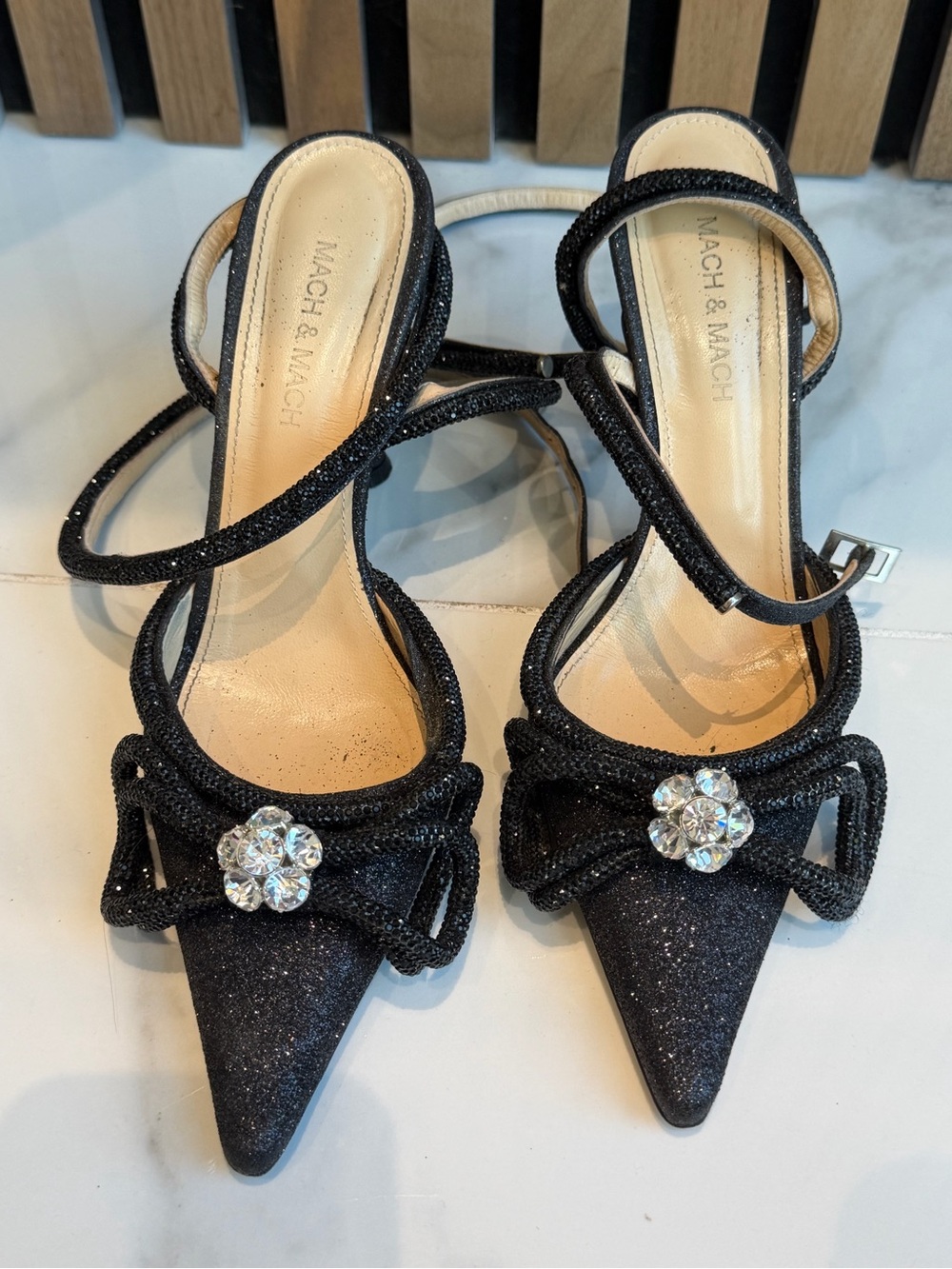 MACH & MACH Black Glitter Pointed Toe Strappy Heels with Crystal Bow